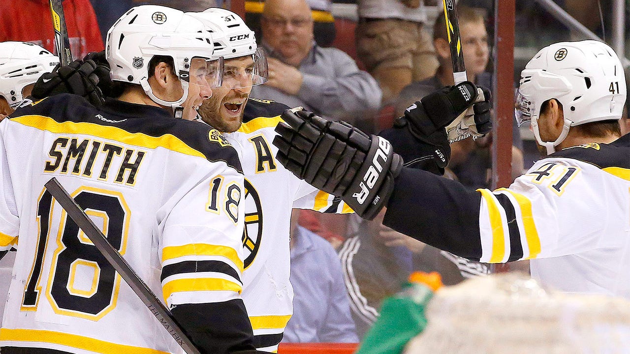 Bruins rally in 3rd period win 12th in a row